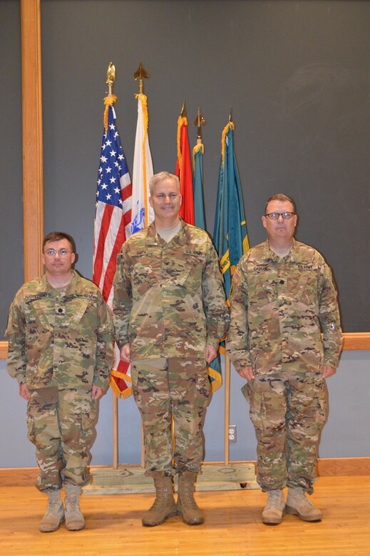 Lt. Col. Michael Napolitano (left), incoming SWCPC commander, Col. Michael Smith (center), ARCOG Commander, and Lt. Col. John Cadran (right), outgoing SWCPC commander, prepare for the SWCPC change of command.  Napolitano took command of ARCOG’s South West Cyber Protection Center in San Antonio, Texas, April 16, 2016. (Photo courtesy of Army Staff Sgt. Manuel Argumeno.)