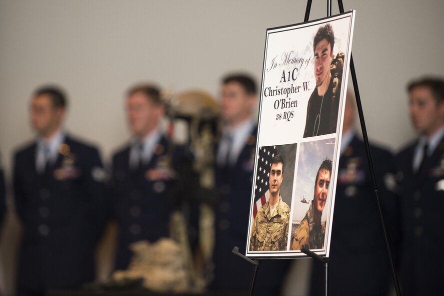 U.S. Air Force Airmen from the 38th Rescue Squadron share their fondest memories of a fellow pararescueman, during a memorial ceremony for Airman 1st Class Christopher O’Brien, June 10, 2016, at Moody Air Force Base, Ga. Throughout his career, O’Brien distinguished himself while deployed in support of Operation INHERENT RESOLVE earning him an Air Medal. (U.S. Air Force photo by Senior Airman Ceaira Tinsley/Released)