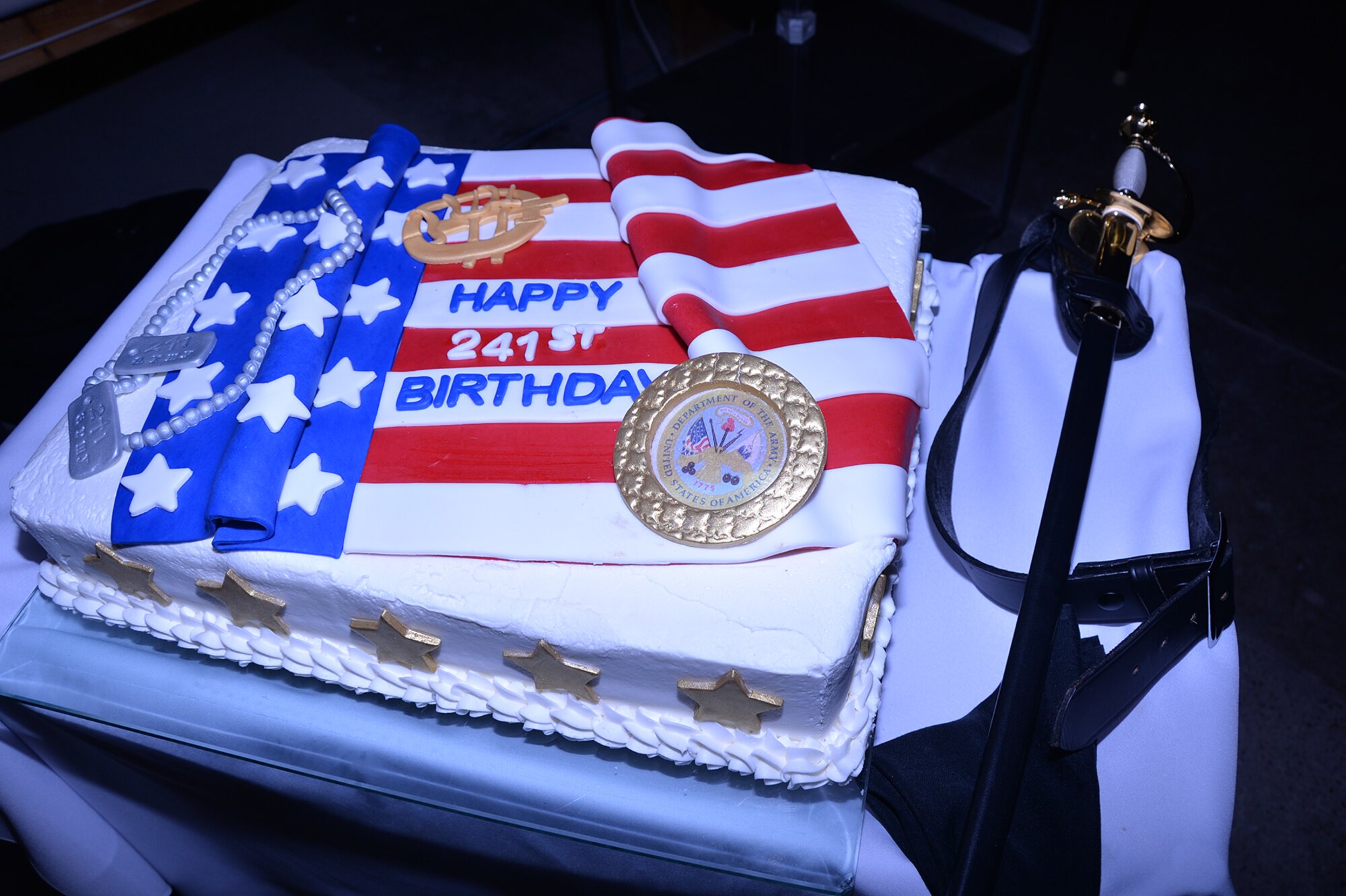 The 344th Military Intelligence Battalion’s cake represents the celebration of the Army’s 241st birthday during the 344th MI BN Army ball at the Fort Concho Stables in San Angelo, Texas, June 10, 2016. The 344th MI BN is located at Goodfellow Air Force Base, Texas. (U.S. Air Force photo by Airman 1st Class Randall Moose/Released)