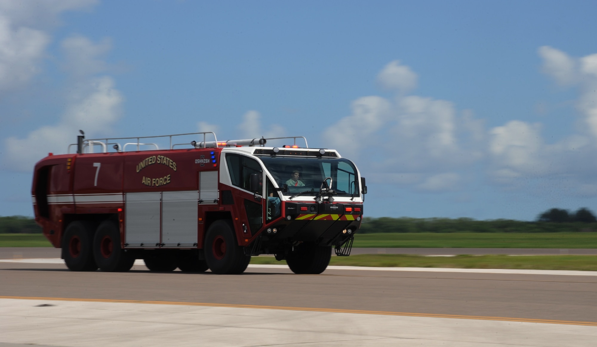 A driver/operator assigned to the 6th Civil Engineer Squadron conducts a speed and brake test in a new Striker 3000 fire truck June 9, 2016, at MacDill Air Force Base, Fla. The new fire truck can reach a top speed of 70 miles per hour, which allows a quick response time. (U.S. Air Force photo by Airman Adam R. Shanks)