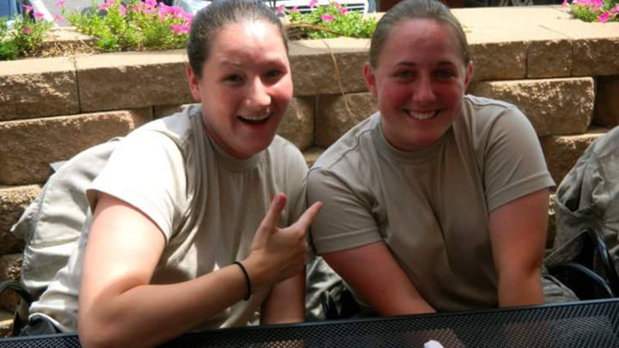 Staff Sgt. Jamie Engle, left, a 744th Communication Squadron cyber transport systems craftsman, and then-Staff Sgt. Shayna Engle pose for an undated photo at Joint Base Andrews, Md. (Courtesy photo) 