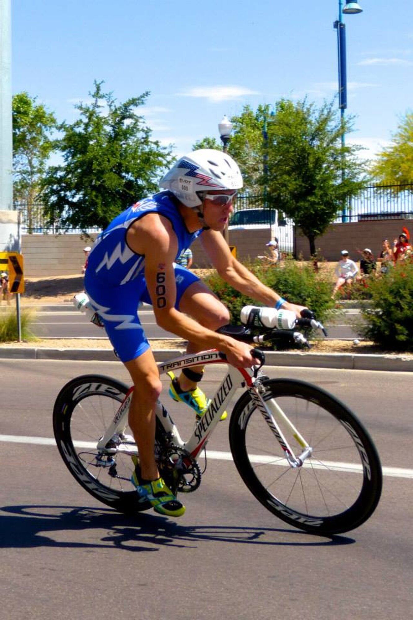 1st Lt. John Bierman, 2nd Space Warning Squadron Delta Crew deputy flight commander, rides a bike in a 2014 triathlon in Tempe, Arizona. Bierman competed for four years on the United States Air Force Academy triathlon team and will compete for the third time on the U.S. Air Force triathlon team June 15-19, 2016, in Ventura County, Calif. (Courtesy photo by Vivien Cook) 