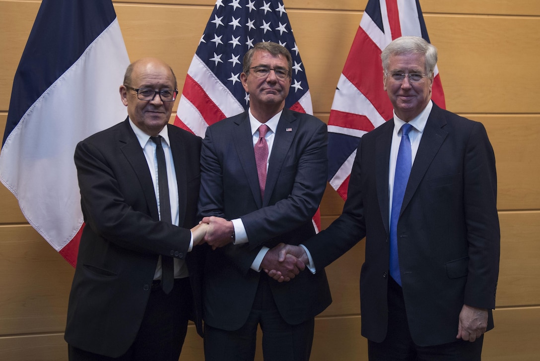 Defense Secretary Ash Carter, center, stands for a photo with French Defense Minister Jean-Yves Le Drian, left, and British Defense Secretary Michael Fallon at NATO headquarters in Brussels, June 14, 2016. DoD photo by Air Force Senior Master Sgt. Adrian Cadiz