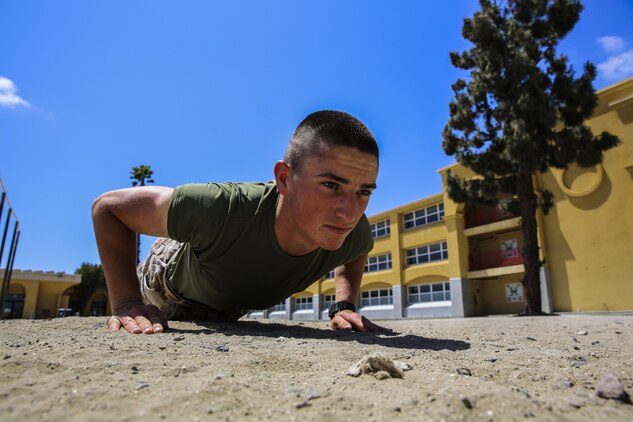 Lance Cpl. Dylan Pinocci, Bravo Company, 1st Recruit Training Battalion, does pull-ups at Marine Corps Recruit Depot San Diego, June 13.  Following graduation, Pinocci will spend 10 days with his family and then move on to the School of Infantry at Marine Corps Base Camp Pendleton, Calif., to learn his military occupational specialty as an infantryman. He plans on making a career out of the Corps and learning everything he can through his experiences.