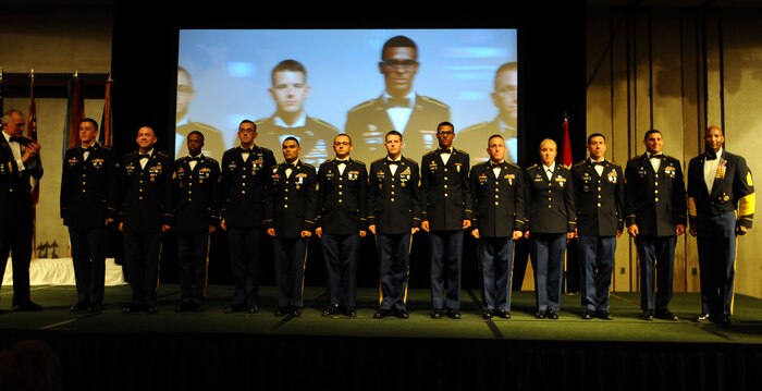 Soldiers from across U.S. Army Pacific who competed in the weeklong Best Warrior Competition stand shoulder to shoulder following the presentation of awards. Spc. Robert D. Miller, from 8th Theater Sustainment Command, Fort Shafter, and Sgt. Joseph W. Polcsa, from the 25th Infantry Division, Schofield Barracks, were named USARPAC Soldier and Noncommissioned Officer of the Year. They will represent USARPAC at the Department of the Army-level Best Warrior Competition in October. (U.S. Army picture by Staff Sgt. Chris McCullough, U.S. Army Pacific Public Affairs)