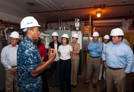 150901-N-ON468-038 PEARL HARBOR (Sept. 1, 2015) Capt. Ken Epps, second from left, commander of Naval Supply systems Command Fleet Logistics Center Pearl Harbor, briefs U.S. congressional staff members during a tour of the Red Hill Underground Fuel Storage Facility. The purpose of the visit was for the congressional staff members to become more familiar with Hawaii's Department of Defense assets and gain a better understanding of U.S. Navy missions within the region. (U.S. Navy photo by Mass Communication Specialist 2nd Class Jeff Troutman/Released)