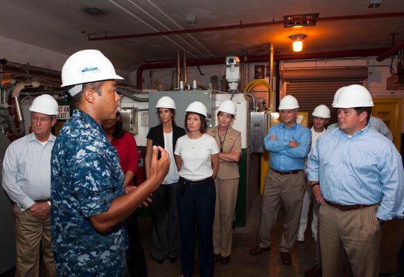 150901-N-ON468-038 PEARL HARBOR (Sept. 1, 2015) Capt. Ken Epps, second from left, commander of Naval Supply systems Command Fleet Logistics Center Pearl Harbor, briefs U.S. congressional staff members during a tour of the Red Hill Underground Fuel Storage Facility. The purpose of the visit was for the congressional staff members to become more familiar with Hawaii's Department of Defense assets and gain a better understanding of U.S. Navy missions within the region. (U.S. Navy photo by Mass Communication Specialist 2nd Class Jeff Troutman/Released)