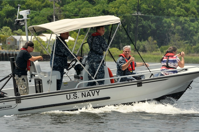 Navy Capt. Timothy Sparks gives a thumbs up during an Honorary Commander's tour of the 628th Security Forces Squadron harbor patrol mission at Joint Base Charleston, S.C., June 13, 2016. The Honorary Commander program provides an opportunity for local leaders to learn about the base's missions and culture. (U.S. Air Force photo/Tech. Sgt. Renae Pittman)