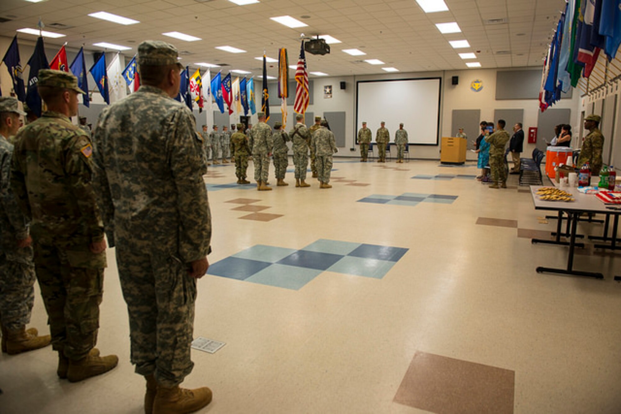Soldiers stand at attention during the Atlantic Training Division 75th Training Command assumption of command of Brig. Gen. Rodney Faulk on Joint Base McGuire-Dix-Lakehurst, N.J. Faulk has served in the Army for 30 years and hails from Battle Creek, Michigan. (U.S. Air Force photo by Senior Airman Joshua King)