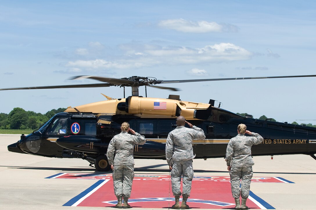 U.S. Marine Corps Gen. Joseph Dunford Jr., Chairman of the Joint Chiefs of Staff, lands for a visit at Joint Base Langley-Eustis, Va., June 13, 2016. From right, U.S. Air Force Col. Caroline Miller, 633rd Air Base Wing commander, 1st Lt. Nickalous Lewis, 633 Air Base Wing protocol officer, and Staff Sgt. Jillian Hotham, Headquarters Air Combat Command protocol specialist, render a salute to Dunford upon his arrival. (U.S. Air Force photo by Airman 1st Class Kaylee Dubois)