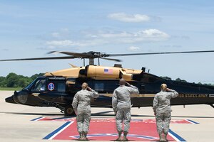 U.S. Marine Corps Gen. Joseph Dunford Jr., Chairman of the Joint Chiefs of Staff, lands for a visit at Joint Base Langley-Eustis, Va., June 13, 2016. From right, U.S. Air Force Col. Caroline Miller, 633rd Air Base Wing commander, 1st Lt. Nickalous Lewis, 633 Air Base Wing protocol officer, and Staff Sgt. Jillian Hotham, Headquarters Air Combat Command protocol specialist, render a salute to Dunford upon his arrival. (U.S. Air Force photo by Airman 1st Class Kaylee Dubois)