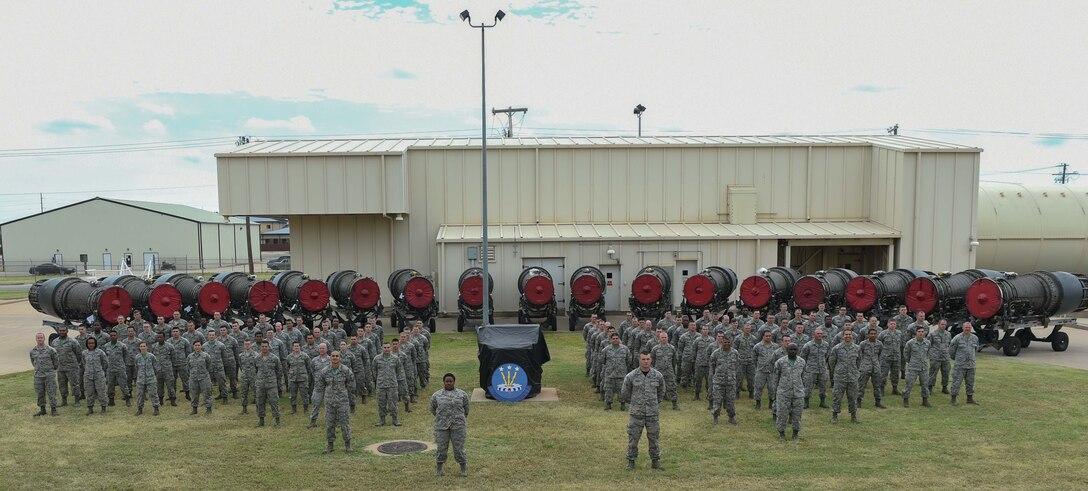 Airmen from the 7th Component Maintenance Squadron stand with spare F101 engines June 10, 2016, at Dyess Air Force Base, Texas. The 7th CMS is responsible for intermediate-level maintenance of the F101 engine, the main engine on the B-1B Lancer. (U.S. Air Force photo by Airman 1st Class Quay Drawdy/Released)