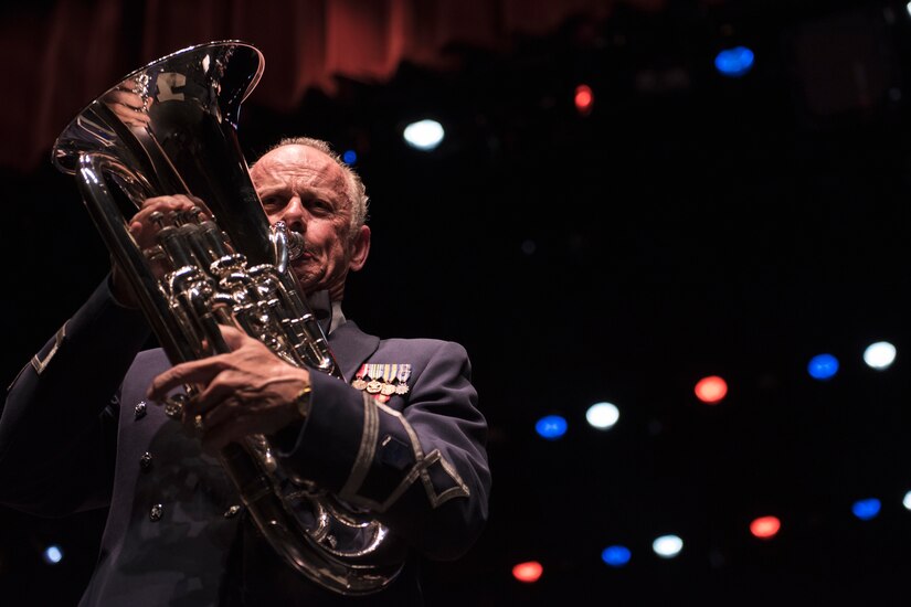 Retired Chief Master Sgt. Brian Bowman, U.S. Air Force Band alumni euphoniumist, plays the euphonium during the U.S. Air Force Band’s 75th Anniversary celebration June 11, 2016, at George Mason University’s Center for the Arts Concert Hall in Fairfax, Va. The U.S. Air Force band played 16 songs that included performances from retired conductors and musicians. (U.S. Air Force photo by Airman 1st Class Philip Bryant)