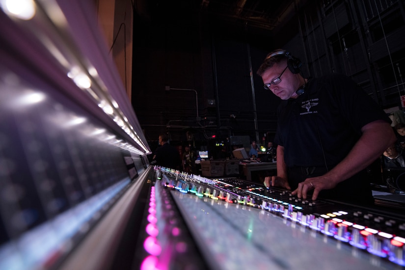 Master Sgt. James DeVaughn, U.S. Air Force Band audio engineer, controls audio levels throughout the U.S. Air Force Band’s 75th Anniversary celebration June 11, 2016, at George Mason University’s Center for the Arts Concert Hall in Fairfax, Va. DeVaughn was one of five audio engineers playing a behind-the-scenes role during the concert. (U.S. Air Force photo by Airman 1st Class Philip Bryant)
