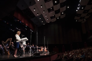 Secretary of the Air Force Deborah Lee James delivers opening remarks at the U.S. Air Force Band's 75th Anniversary celebration June 11, 2016, at George Mason University's Center for the Arts Concert Hall in Fairfax, Va. James reflected upon the band's tradition of service, excellence and innovation that has been vital to the Air Force. (U.S. Air Force photo by Airman 1st Class Philip Bryant)
