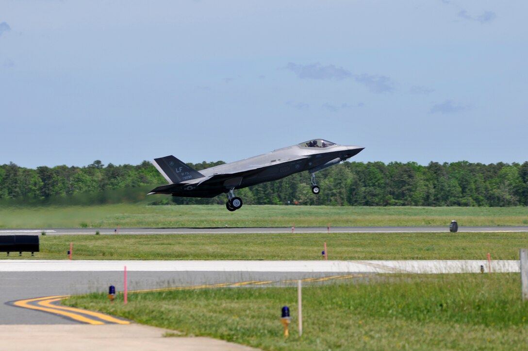 U.S. Air Force Maj. Will Andreotta, F-35 Lightning II fighter pilot from the 56th Fighter Wing, Luke Air Force Base, Arizona, takes off in afterburner power at the Atlantic City International Airport in Egg Harbor Township, N.J. on May 29, 2016. Pilots and crew from the USAF F-35 Heritage Flight Team made a stop at the 177th Fighter Wing of the New Jersey Air National Guard on the way to their performance at the Jones Beach Airshow in Wantagh, New York on May 28 and 29. (U.S. Air National Guard photo by Tech. Sgt. Paul Woodring/Released)