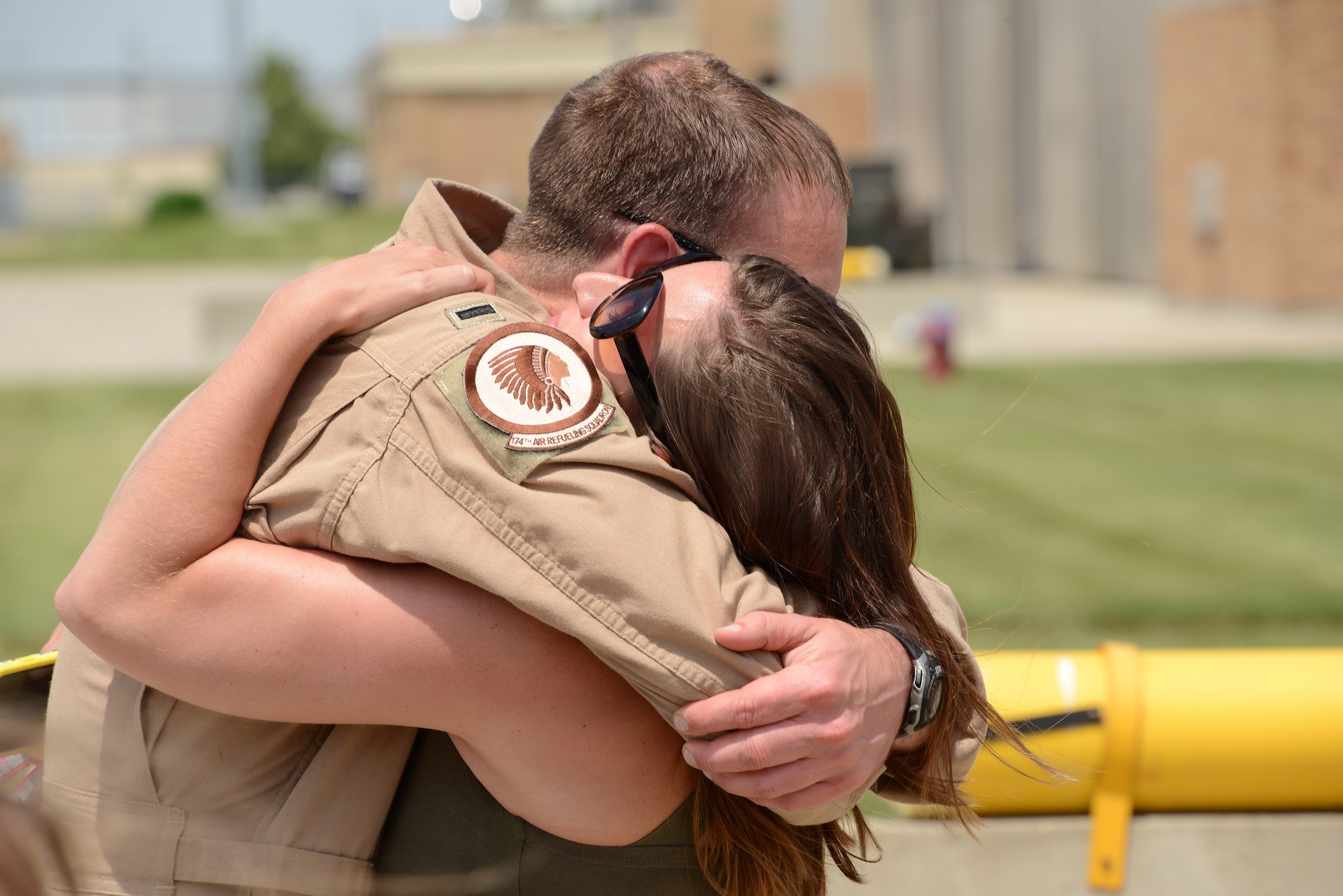 With temperatures in the upper 90’s 1st Lt. Kelly Brower a KC-135 pilot with the 185th Air Refueling Wing holds his wife in a very warm embrace at the Sioux City, Iowa Air National Guard base on June 11, 2016 after returning from Al Udeid Air Base, Qatar. 185th ARW unit members and aircraft were temporarily assigned to the 340th Expeditionary Air Refueling Squadron at Al Udeid since February, where they were providing midair refueling support for U.S. and partner nation aircraft in direct support of Operation Inherent Resolve.
(U.S. Air Guard Photo by: Master Sgt. Vincent De Groot/released)