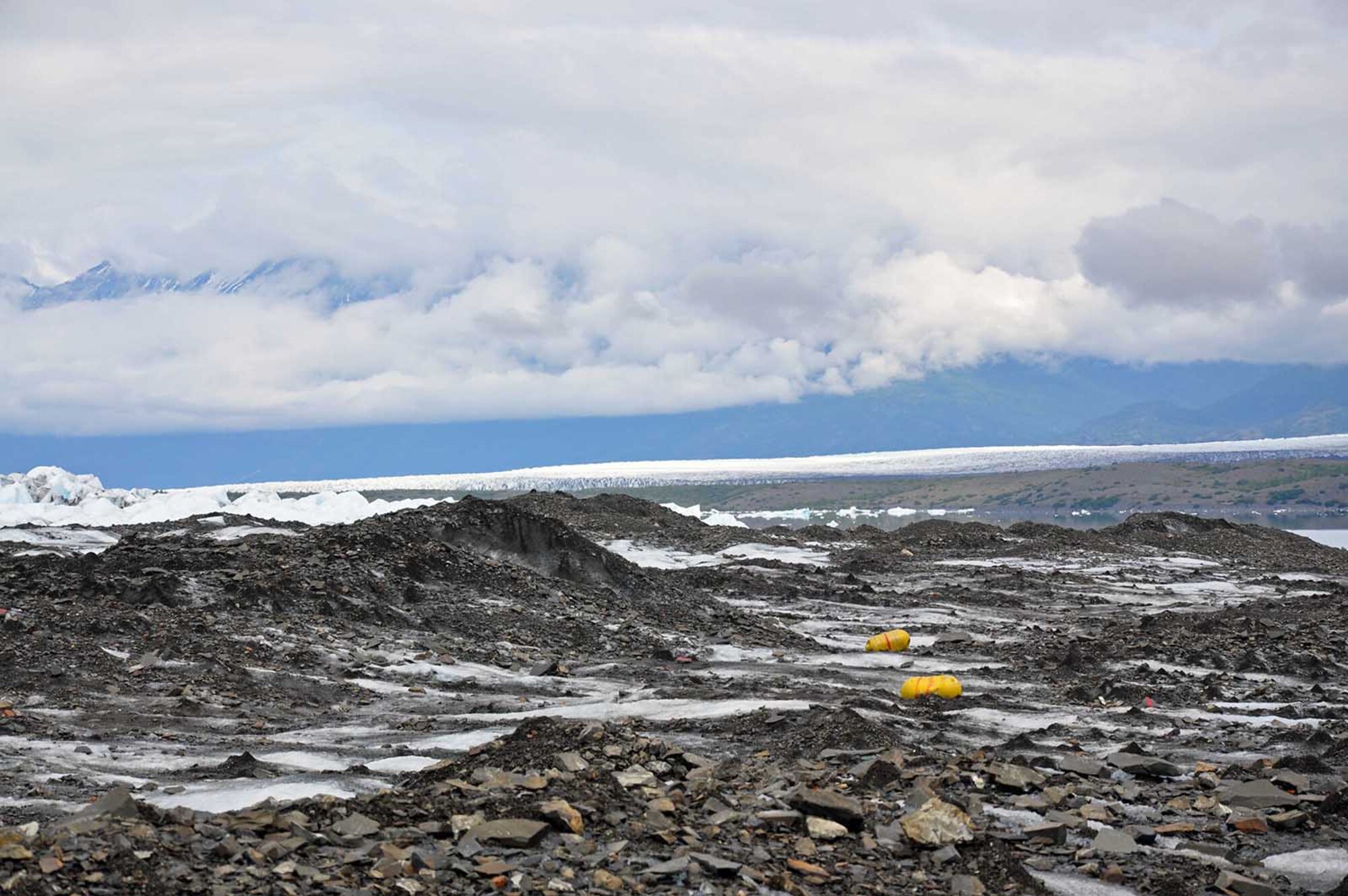 Debris from an aircraft sits on top of Colony Glacier, near Anchorage, Alaska, June 13, 2016. The debris is from a U.S. Air Force C-124 Globemaster II that crashed onto the glacier in 1952 with 52 servicemembers on board. A recovery effort, Operation Colony Glacier, has taken place every summer since 2012 by personnel from Alaskan Command, the Alaska National Guard, Air Force Mortuary Affairs Operations, U.S. Army Alaska, 673d Air Base Wing, 3d Wing and Detachment 1, 66 Training Squadron. (U.S. Air Force photo/Capt. Anastasia Wasem)
