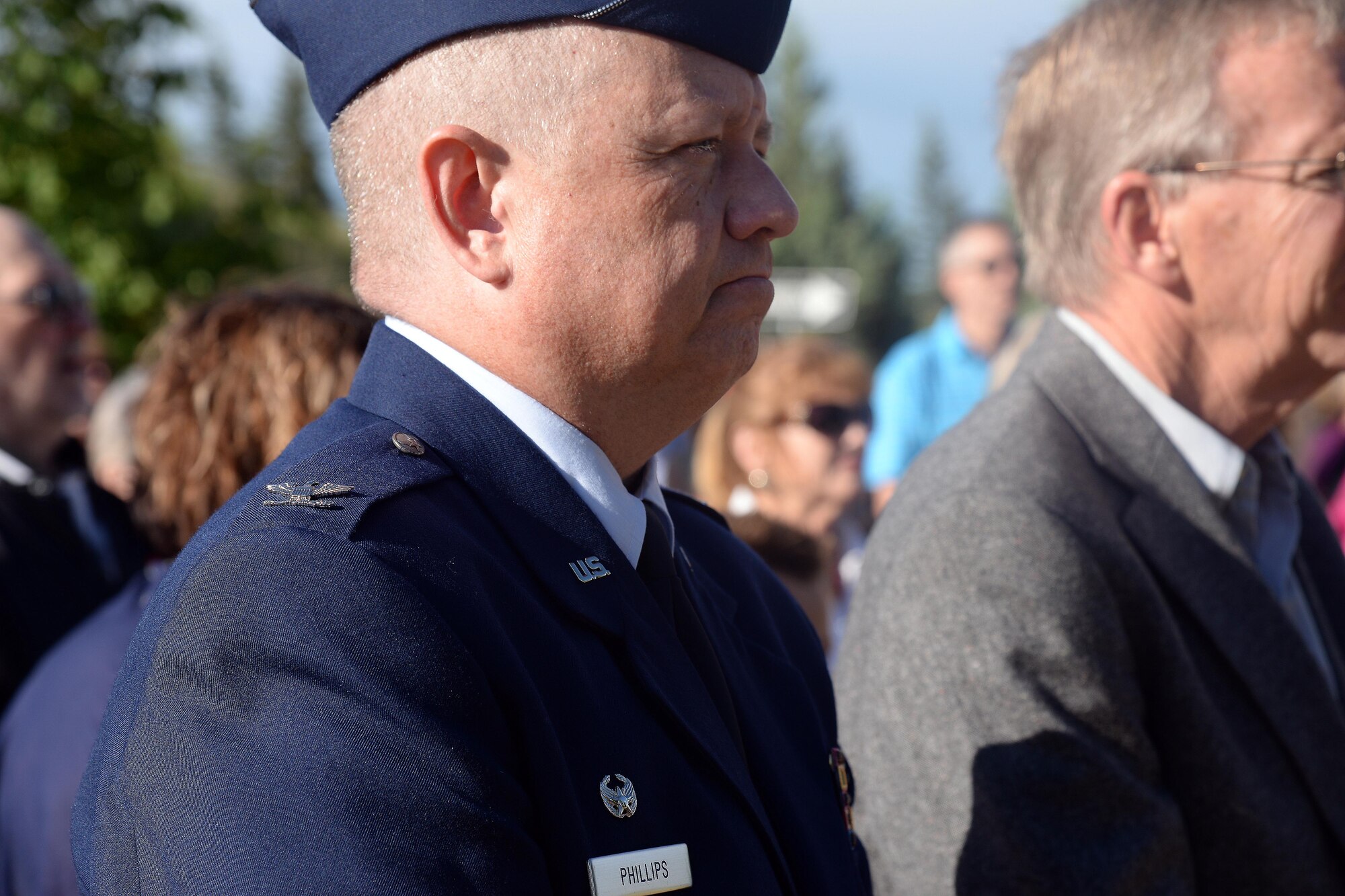 Col. Christopher Phillips, 341st Medical Group commander, attends a ceremony in honor of Flag Day June 14, 2016, in Great Falls, Mont. Civilians and military members assigned to the 341st Missile Wing and the 120th Airlift Wing came together to honor the nation’s flag. (U.S. Air Force photo/Airman 1st Class Magen M. Reeves)