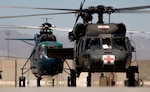 An Army National Guard UH-60 Black Hawk helicopter crewed by Soldiers from Arkansas and West Virginia’s 1st Battalion, 104th Aviation Regiment, 40th Combat Aviation Brigade, lands at Forward Operating Base Dahlke, Afghanistan, May 19, 2016. (Army photo by Staff Sgt. Ian Kummer)