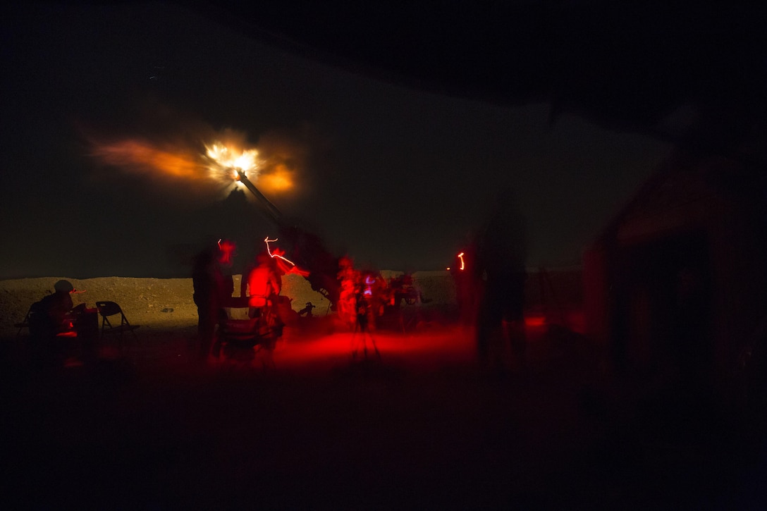 U.S. soldiers assigned to 1st Battalion, 320 Field Artillery Regiment, 2nd Brigade Combat Team, 101st Airborne Division (Air Assault) fire an M777 howitzer from Kara Soar Base, Iraq, during a night operation in support of the Iraqi army on June 3, 2016. Fire missions are one way the coalition assists the Iraqi army to defeat the Islamic State of Iraq and the Levant. Advise-and-assist teams enable Iraqi security forces as they prepare for upcoming operations by sharing intelligence and helping them develop security strategies and targeting plans. Army photo by Spc. Jaquan P. Turnbow