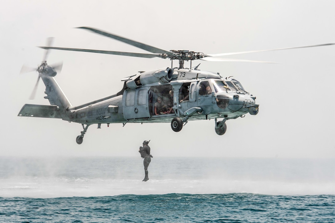 Sailors conduct cast and recovery operations in the Arabian Gulf, June 6, 2016. The sailors are explosive ordnance disposal technicians assigned to Commander, Task Group 56, which conducts mine countermeasures, explosive ordnance disposal, salvage diving and force protection operations throughout the U.S. 5th Fleet area of operations. Navy photo by Petty Officer 2nd Class Sean Furey