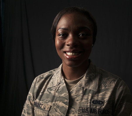 Senior Airman Ja’Mesha Pratt, 18th Operations Support Squadron airfield systems technician, poses for a photo June 15, 2016, at Kadena Air Base, Japan. Pratt heroically saved the lives of two local Okinawans after witnessing them involved in a terrible accident. She pulled them from their overturned vehicle and applied Self-Air Buddy care until first-responders arrived. (U.S. Air Force photo by Naoto Anazawa) 