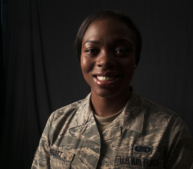 Senior Airman Ja’Mesha Pratt, 18th Operations Support Squadron airfield systems technician, poses for a photo June 15, 2016, at Kadena Air Base, Japan. Pratt heroically saved the lives of two local Okinawans after witnessing them involved in a terrible accident. She pulled them from their overturned vehicle and applied Self-Air Buddy care until first-responders arrived. (U.S. Air Force photo by Naoto Anazawa) 