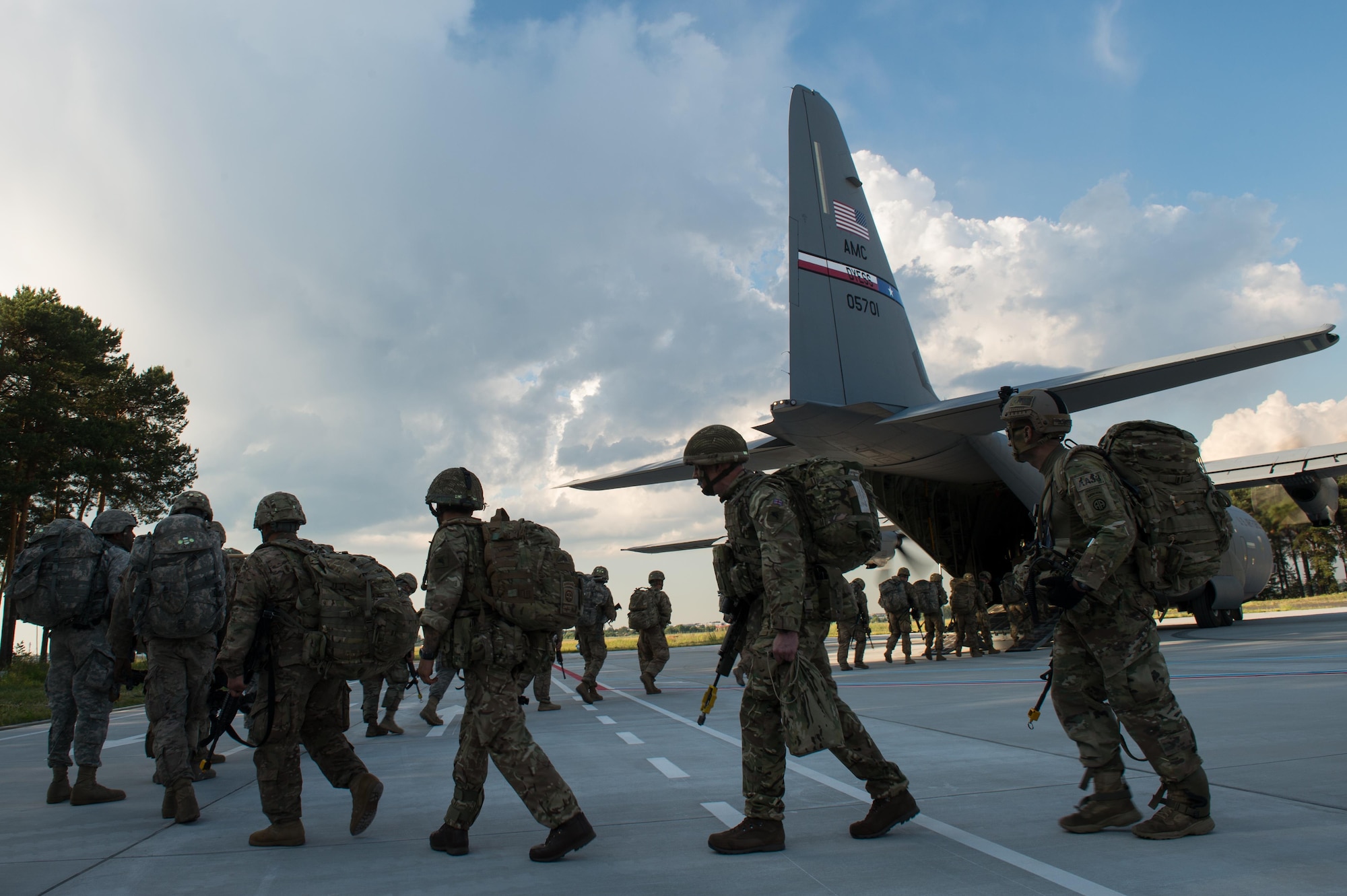 U.S. Soldiers assigned to the 82nd Airborne Division board a C-130J Super Hercules during Exercise Swift Response 16 at the Bydgoszcz Airport, Poland, June 8, 2016. Exercise SR16 is one of the premier military crisis response training events for multinational airborne forces in the world, the exercise has more than 5,000 participants from 10 NATO nations. (U.S. Air Force photo by Master Sgt. Joseph Swafford/Released)