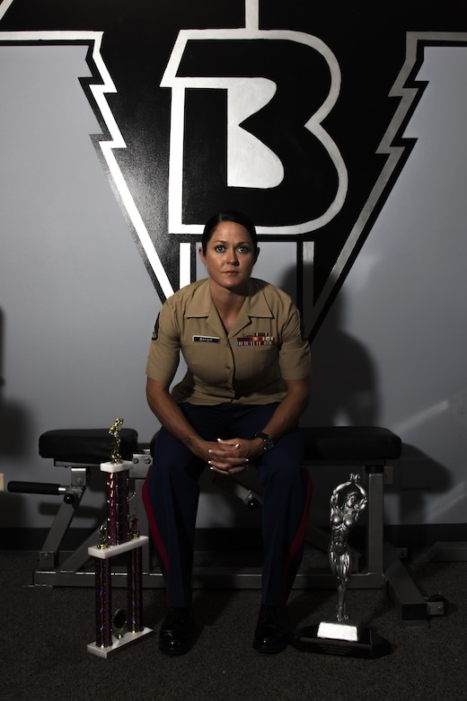 Marine Corps Staff Sgt. Annemarie E. Baker poses for a photo in the gym in Libertyville, Ill., where she trained to win her first bodybuilding competition, May 26, 2016. Baker, a 14-year Marine veteran and mother, attributed her decision to compete to her military career. Marine Corps photo by Cpl. Zachery Martin