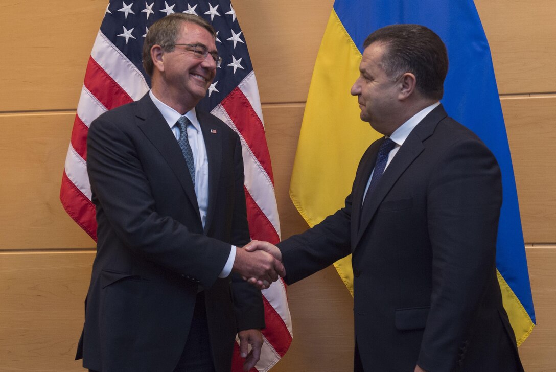 Defense Secretary Ash Carter exchanges greetings with Ukrainian Defense Minister Gen. Stepan Poltorak at NATO headquarters in Brussels, June 15, 2016. Carter is in Brussels to attend a NATO defense ministers meeting ahead of the biannual NATO summit to be held in Warsaw, Poland, in July. DoD photo by Air Force Senior Master Sgt. Adrian Cadiz