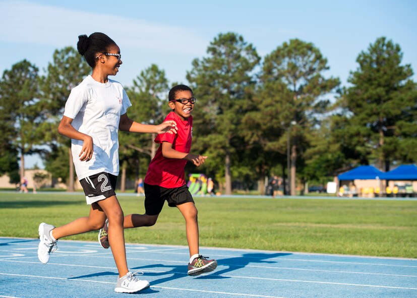 Natalia and Joseph Williams IV, daughter and son of retired U.S. Air Force Tech. Sgt. Joseph Williams III, race during the Tiger Run, June 11, 2016, at Moody Air Force Base, Ga. The registration for the Tiger Run was $100 per team, a cost that could be split between team members. (U.S. Air Force photo by Airman 1st Class Janiqua P. Robinson/Released)