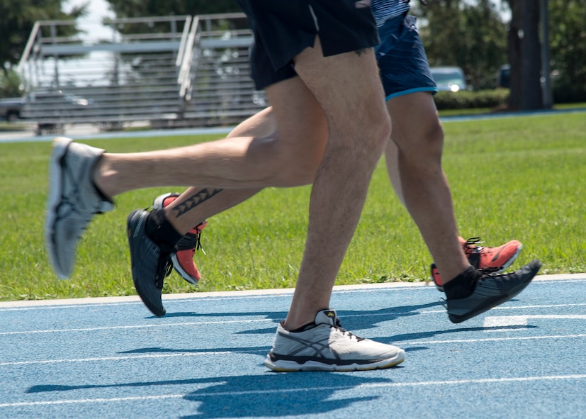 Runners race during the Tiger Run, June 11, 2016, at Moody Air Force Base, Ga. Individuals ran at their own pace during the run; with some choosing to sprint it out, while others lightly jogged. (U.S. Air Force photo by Airman 1st Class Janiqua P. Robinson/Released)