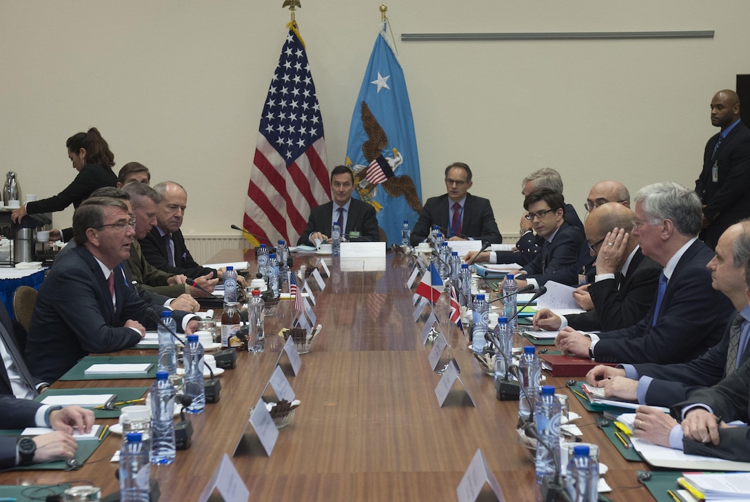 Defense Secretary Ash Carter, left, meets with British Defense Secretary Michael Fallon, second from right, and French Defense Minister Jean-Yves Le Drian, third from right, at NATO headquarters in Brussels, June 14, 2016. DoD photo by Air Force Senior Master Sgt. Adrian Cadiz