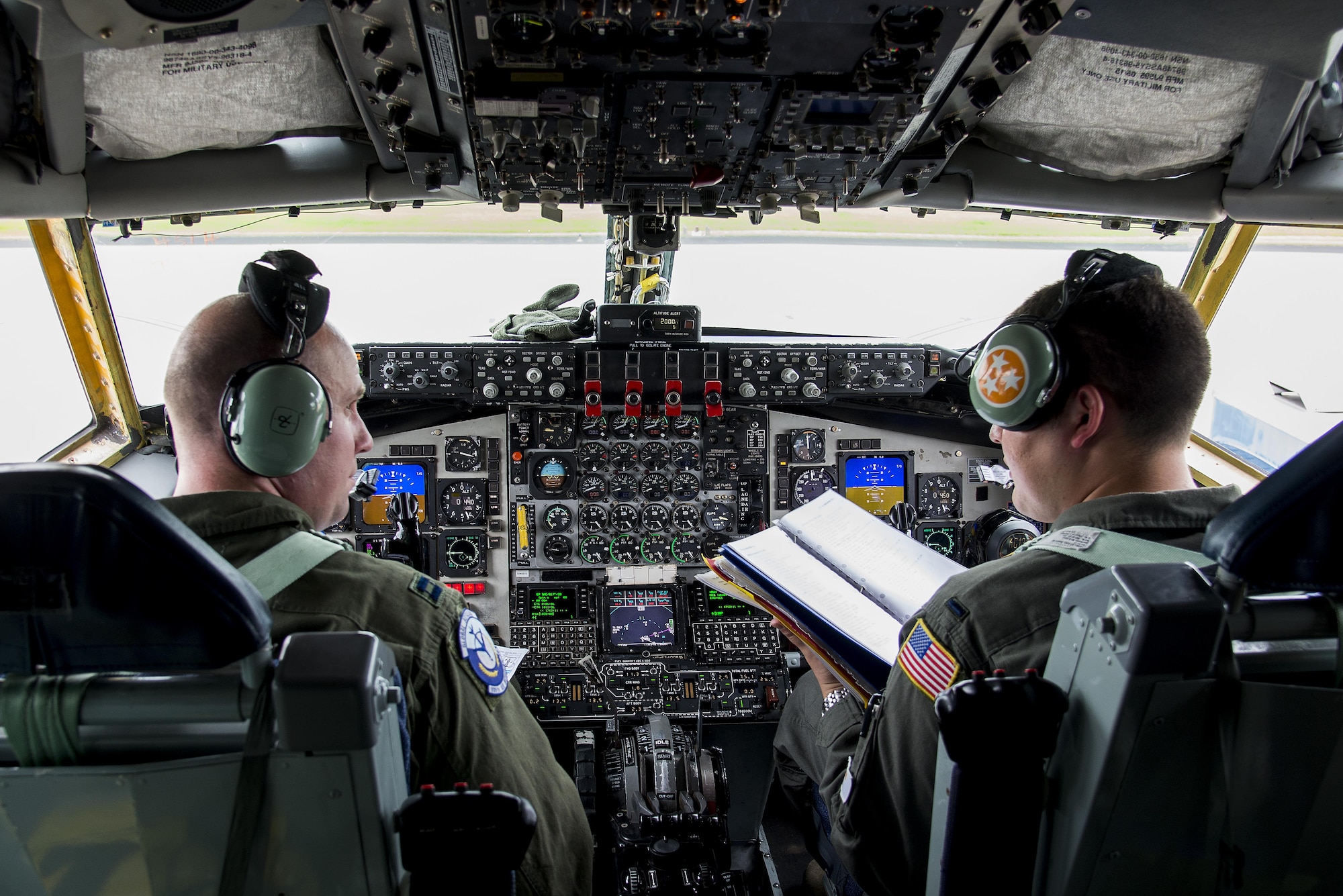 Captain Jeffrey Everett, 906th Air Refueling Squadron pilot, and 1st Lt. Ben Farr 906th ARS review a preflight checklist prior to a refueling mission June 3, 2016 at Scott Air Force Base, Illinois. The mission was a training sortie focusing on maintain aircrew readiness in conjunction with the 115th Fighter Wing of the Wisconsin Air National Guard. (U.S. Air Force Photo by Airman Daniel Garcia)