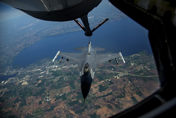 An F-16 jet from the Fighter Wing of the Wisconsin Air National Guard participates in an air refueling mission June 3, 2016. The mission was a training sortie focusing on maintain aircrew readiness in conjunction with the 906th Air Refueling Squadron and the 126th Air Refueling Wing. (U.S. Air Force Photo by Airman Daniel Garcia)
