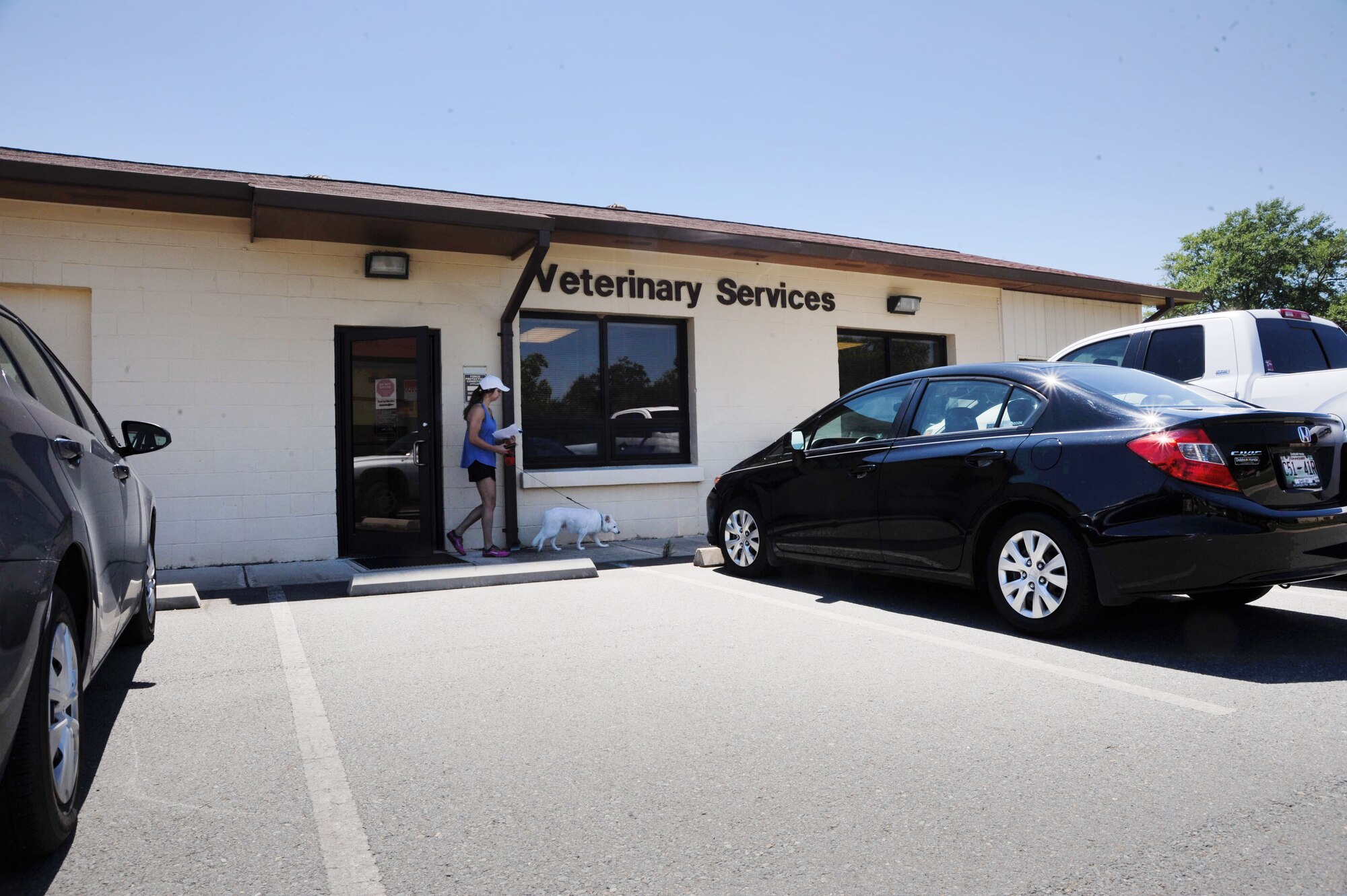 The base veterinary clinic provides care for military working dogs and personal pets at Barksdale Air Force Base, La., Monday to Friday, 8:00 a.m. to 4:30 p.m. People planning to change stations are encouraged to take their pets to the clinic for checkups prior to moving and upon arrival at their new station. To make an appointment, call 456-3923. (U.S. Air Force photo/Airman Alexis C. Frost)