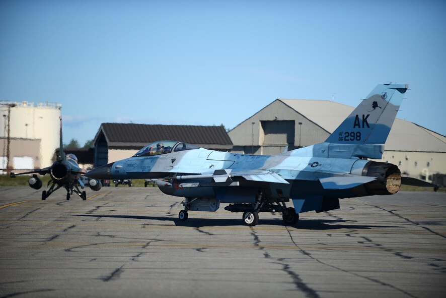An F-16 Fighting Falcon assigned to the 18th Aggressor Squadron, departs for take-off during RED FLAG-Alaska 16-2, on Eielson Air Force Base, Alaska, June 15, 2016. (U.S. Air Force photo by Tech. Sgt. Steven R. Doty)