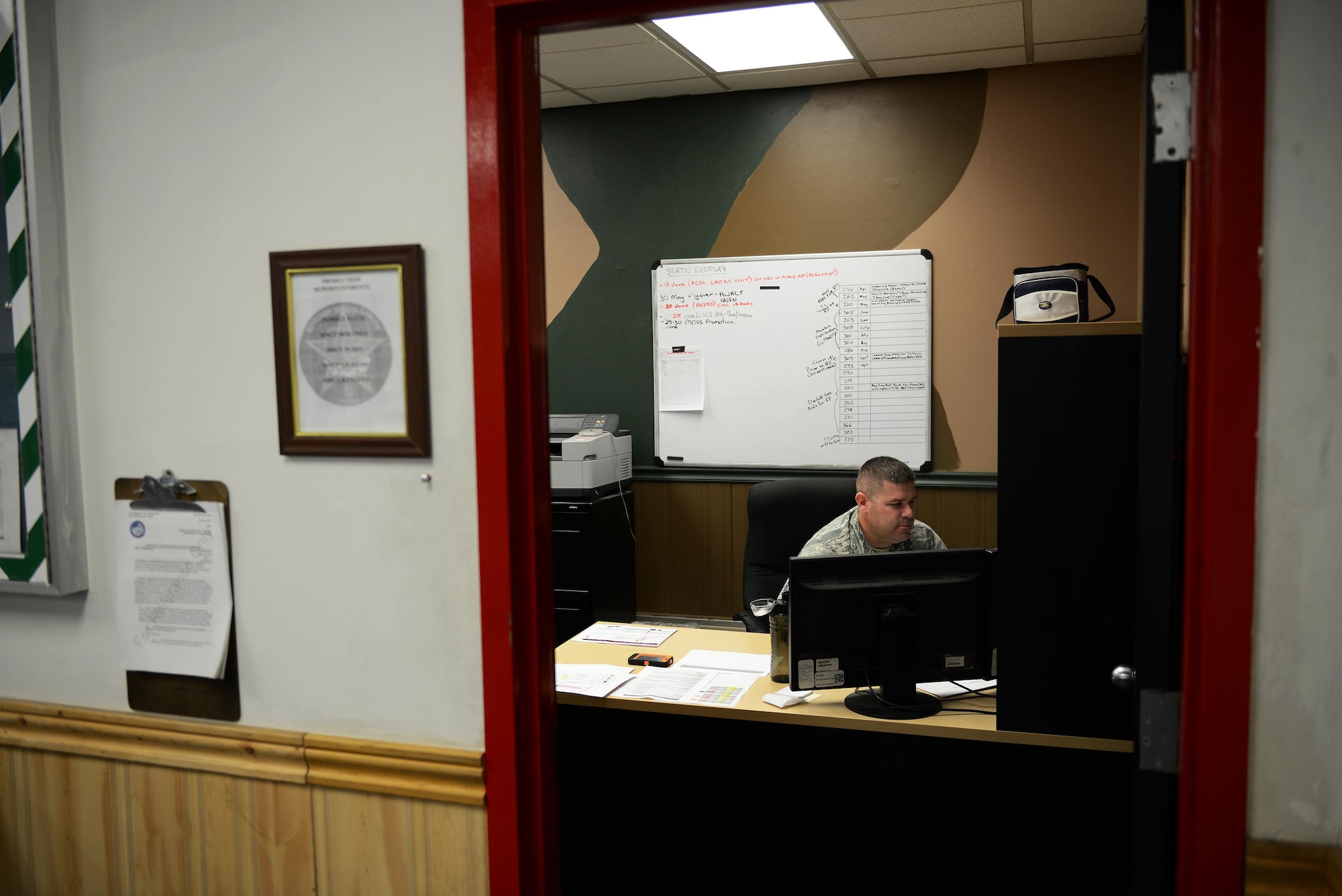 U.S. Air Force Master Sgt. Michael Davis, 18th Aircraft Maintenance Unit lead production superintendent, verifies aircraft schedules at the 18th Aggressor Squadron during RED FLAG-Alaska 16-2, on Eielson Air Force Base, Alaska, June 15, 2016. (U.S. Air Force photo by Tech. Sgt. Steven R. Doty)