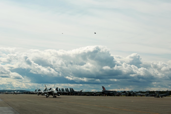 U.S. Marine Corps F/A-18C Hornet aircraft with Marine Fighter Attack Squadron (VMFA) 314, stationed at Marine Corps Air Station Miramar, California, taxi down the runway at Eielson Air Force Base, Alaska, during their participation in Red Flag-Alaska 16-2, June 7, 2016. Red Flag-Alaska 16-2 provides squadrons the opportunity to train with joint and international units, increasing their combat skills by participating in simulated combat situations in a realistic threat environment. (U.S. Marine photo by Lance Cpl. Donato Maffin/Released)