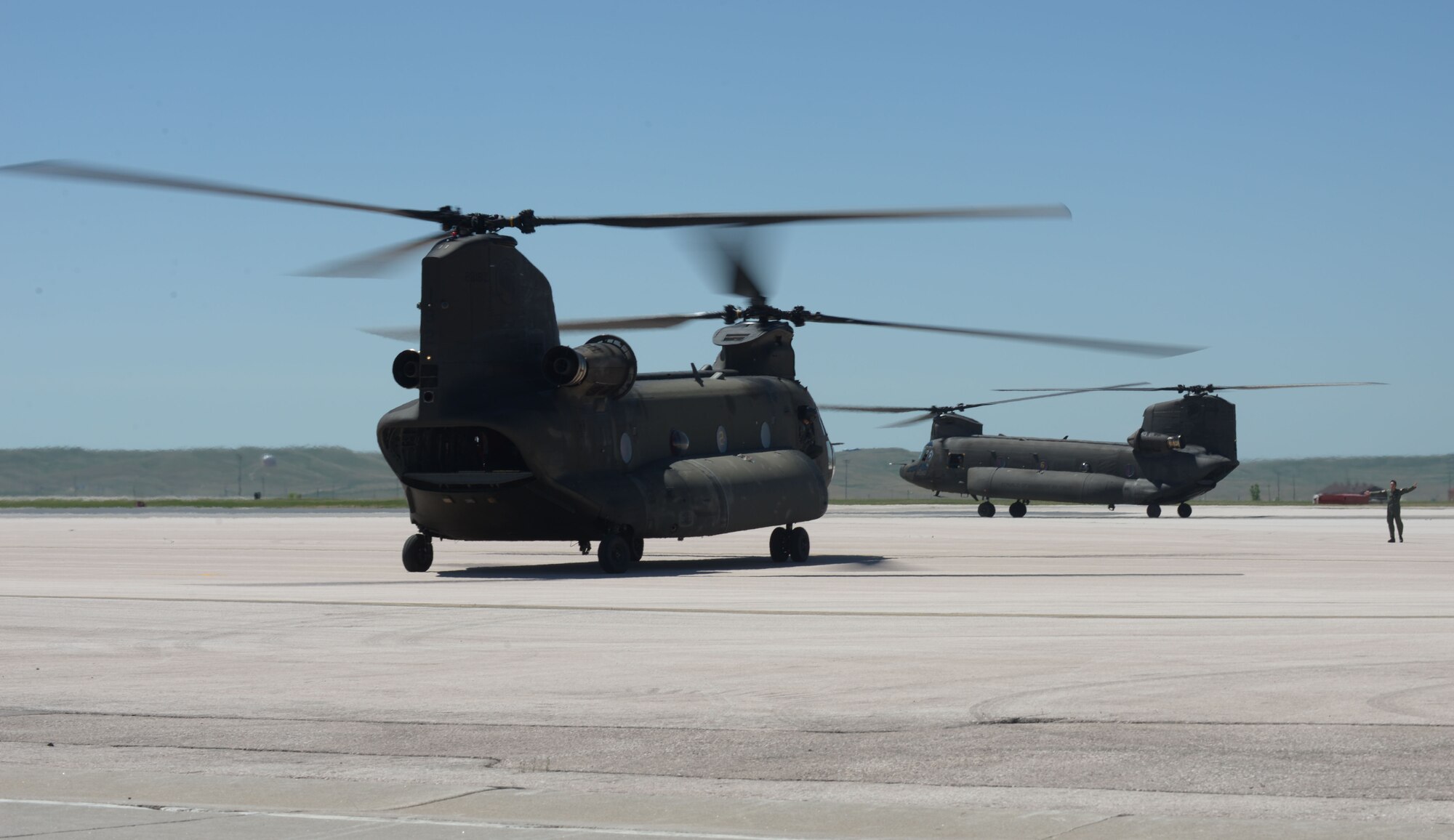 Four Republic of Singapore Air Force CH-47D Chinooks and 80 personnel arrived at Ellsworth Air Force Base, S.D., June 10, 2016, to use Ellsworth as their home station during the South Dakota National Guard’s annual Golden Coyote exercise. The RSAF personnel will be conducting joint training with Airmen, providing vital opportunities for Ellsworth members to participate in combat search and rescue exercises in the Powder River Training Complex. (U.S. Air Force photo by Airman Donald Knechtel/Released)