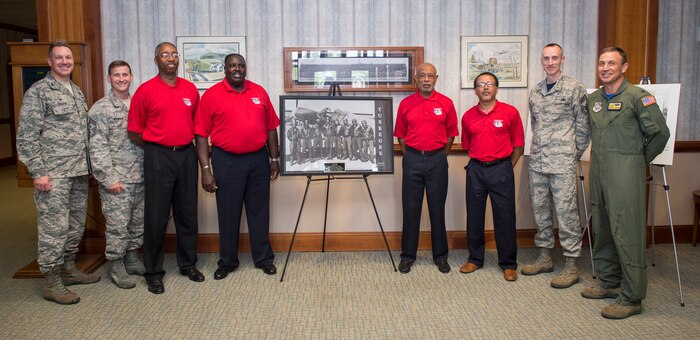 Joint Base Charleston leadership and second generation Tuskegee Airmen pose for a group photo June 3, 2016, at the Charleston Club on JB Charleston – Air Base, S.C. The Tuskegee Airmen were a group of African-American military pilots who fought in World War II. They formed the 477th Bombardment Group and the 332nd Fighter Group of the United States Army Air Forces. (U.S. Air Force photo/Senior Airman Clayton Cupit)
