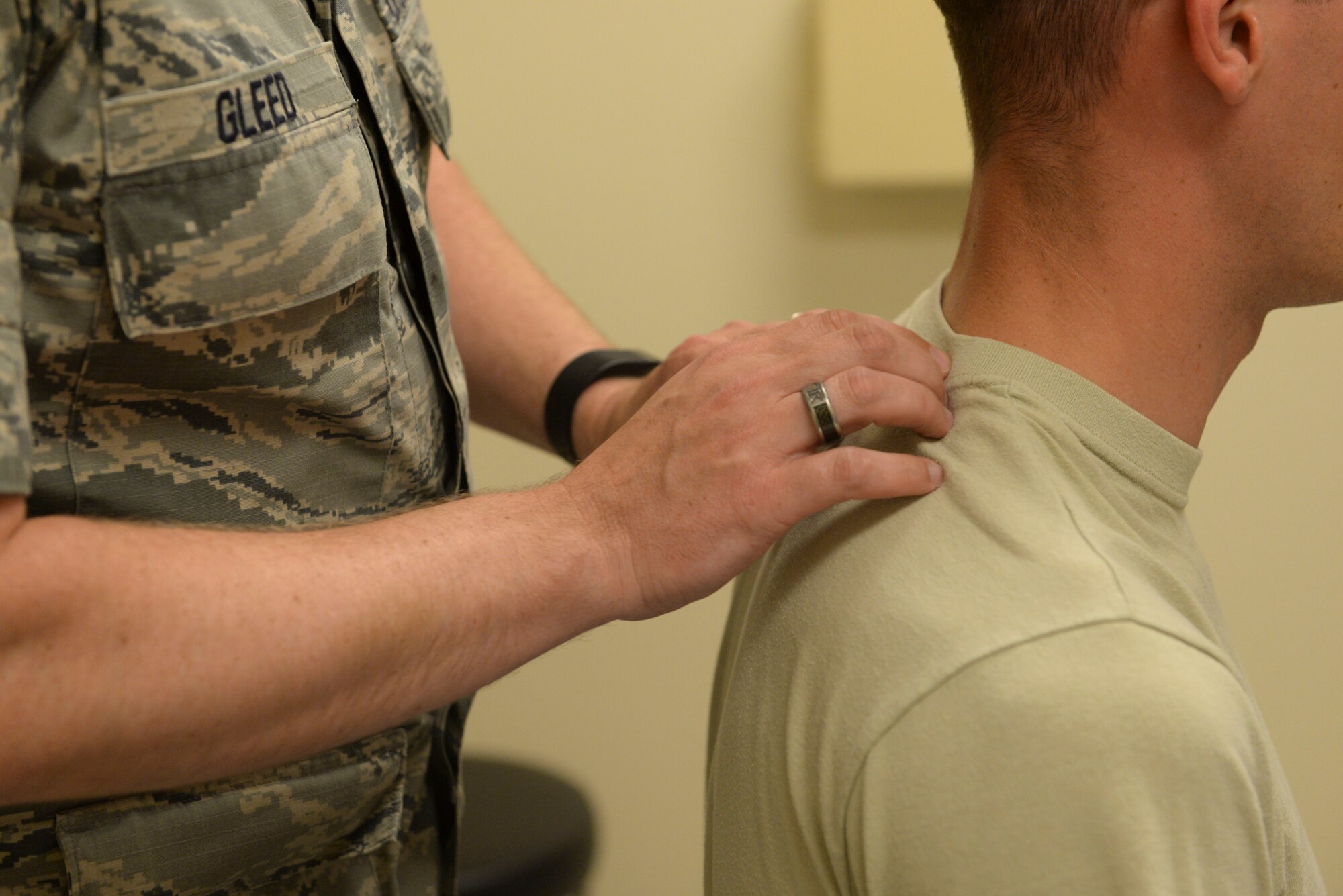 Capt. Justin Gleed, a physical therapist assigned to the 5th Medical Operations Squadron at Minot Air Force Base, N.D., feels for a knot in a patient June 10, 2016. The physical therapy clinic uses their knowledge of the anatomy and physiology of the human body to help correct injuries or impairments so Airmen can continue their job. (U.S. Air Force photo/Airman 1st Class Jessica Weissman)