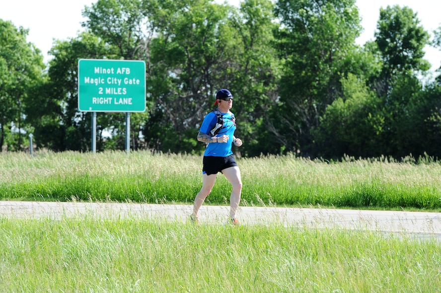 The annual North Dakota event, which began in 1985, raises awareness and funds for Special Olympics North Dakota and the State Summer Games. Over 30 Airmen from Minot Air Force Base participated in the event this year. (U.S. Air Force photos/Senior Airman Kristoffer Kaubisch)