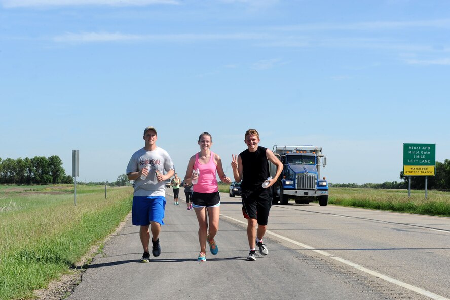 The annual North Dakota event, which began in 1985, raises awareness and funds for Special Olympics North Dakota and the State Summer Games. Over 30 Airmen from Minot Air Force Base participated in the event this year. (U.S. Air Force photos/Senior Airman Kristoffer Kaubisch)