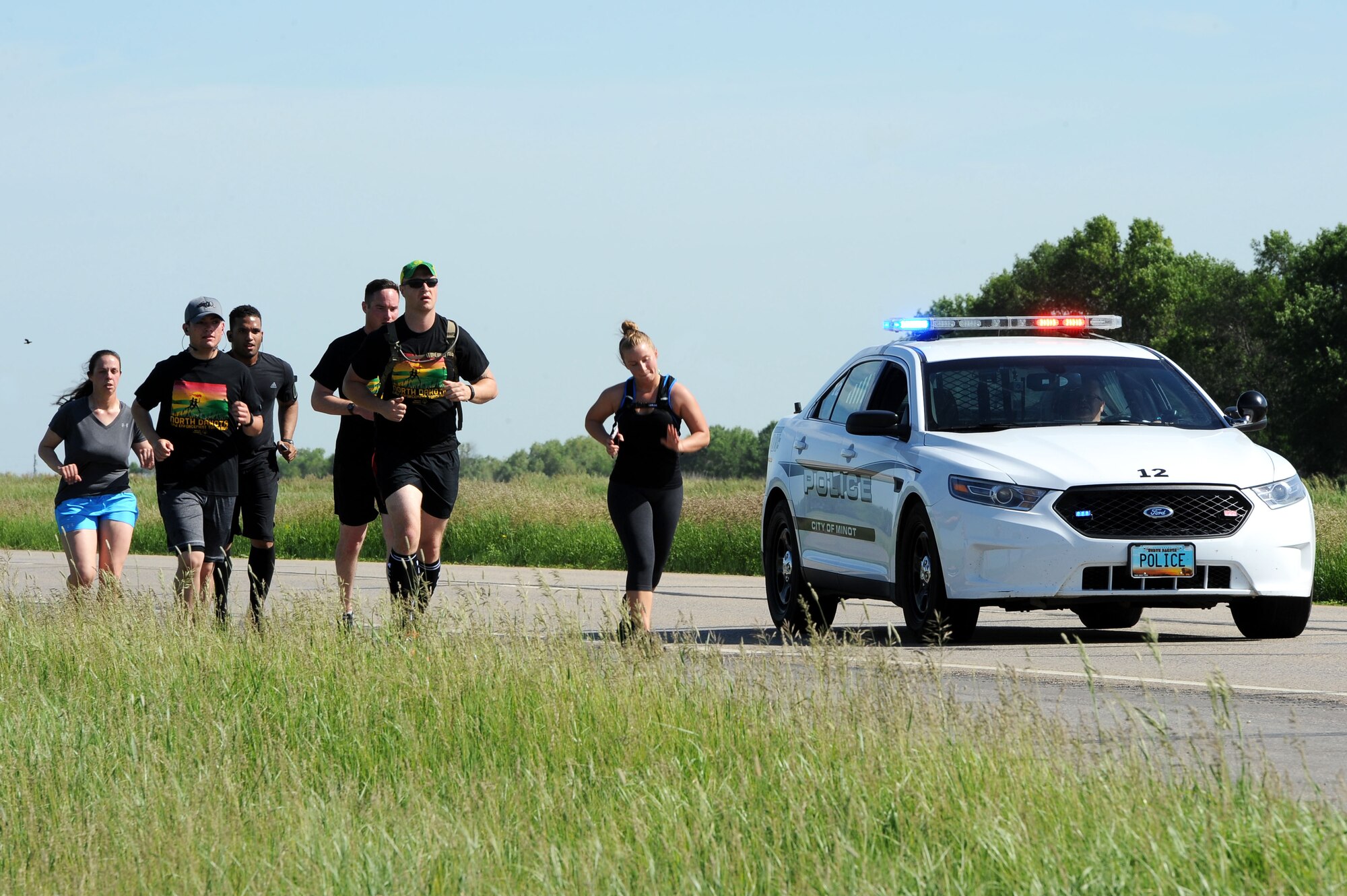 The annual North Dakota event, which began in 1985, raises awareness and funds for Special Olympics North Dakota and the State Summer Games. Over 30 Airmen from Minot Air Force Base participated in the event this year. (U.S. Air Force photos/Senior Airman Kristoffer Kaubisch)