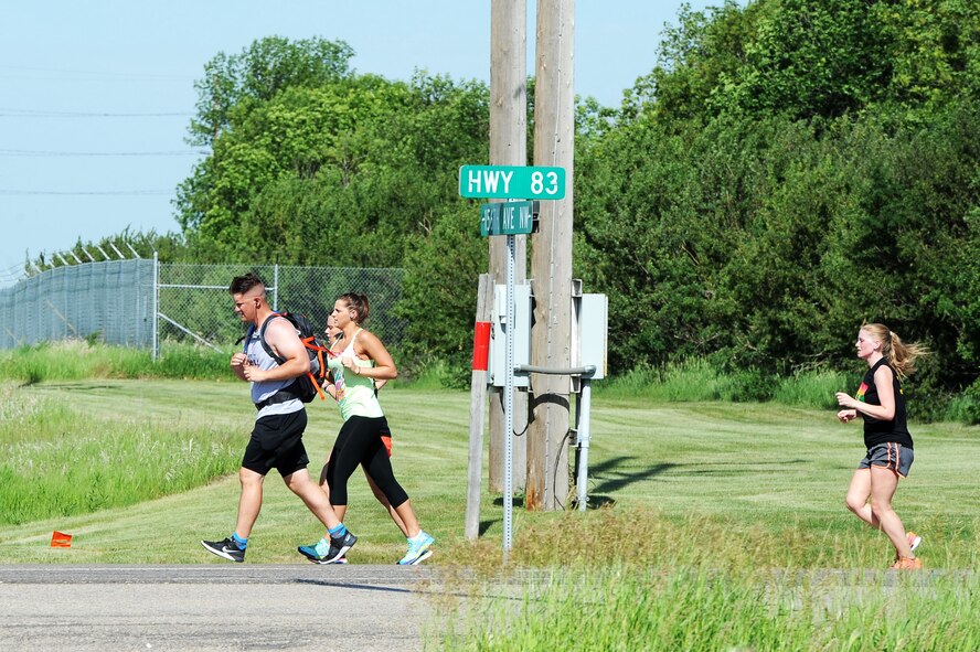 The annual North Dakota event, which began in 1985, raises awareness and funds for Special Olympics North Dakota and the State Summer Games. Over 30 Airmen from Minot Air Force Base participated in the event this year. (U.S. Air Force photos/Senior Airman Kristoffer Kaubisch)