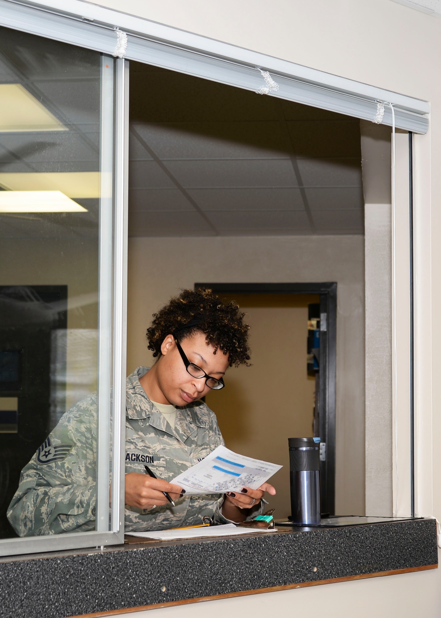 SSgt. Nastasia Jackson fills out paperwork after returning from her airfield safety inspection June 15, 2016 at Warfield Air National Guard Base, Middle River, Md. Jackson is the Maryland Air National Guard June Spotlight Airman. (U.S. Air National Guard photo by Airman 1st Class Enjoli Saunders/RELEASED) 