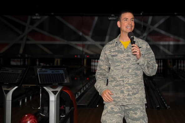U.S. Air Force Brig. Gen. Paul W. Tibbets IV, the commander of the 509th Bomb Wing, speaks during the Stars and Strikes Bowling Center grand opening at Whiteman Air Force Base, Mo., June 10, 2016. Tibbets had the honor of rolling the ceremonious first bowling ball to signify the opening of the facility. (U.S. Air Force photo by Senior Airman Danielle Quilla)  