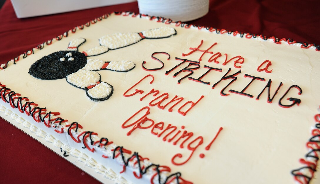 A customized cake waits to be cut during the Stars and Strikes Bowling Center grand opening at Whiteman Air Force Base, Mo., June 10, 2016. The new facility includes flat-screen monitors, large projectors, an expanded dining and kitchen area, and outdoor seating. (U.S. Air Force photo by Senior Airman Danielle Quilla)  